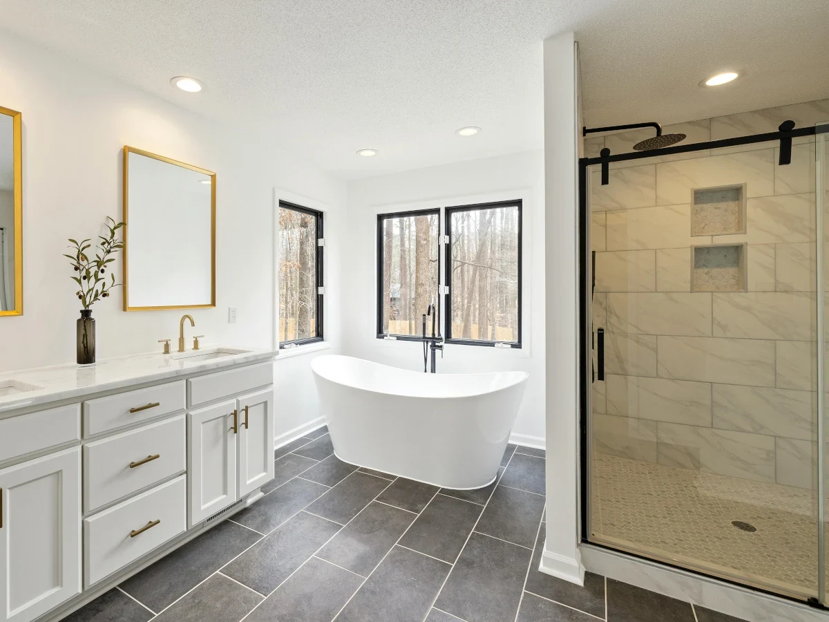 Tiled shower enclosure with glass door installed by Daffodil Tiling in a Swansea bathroom