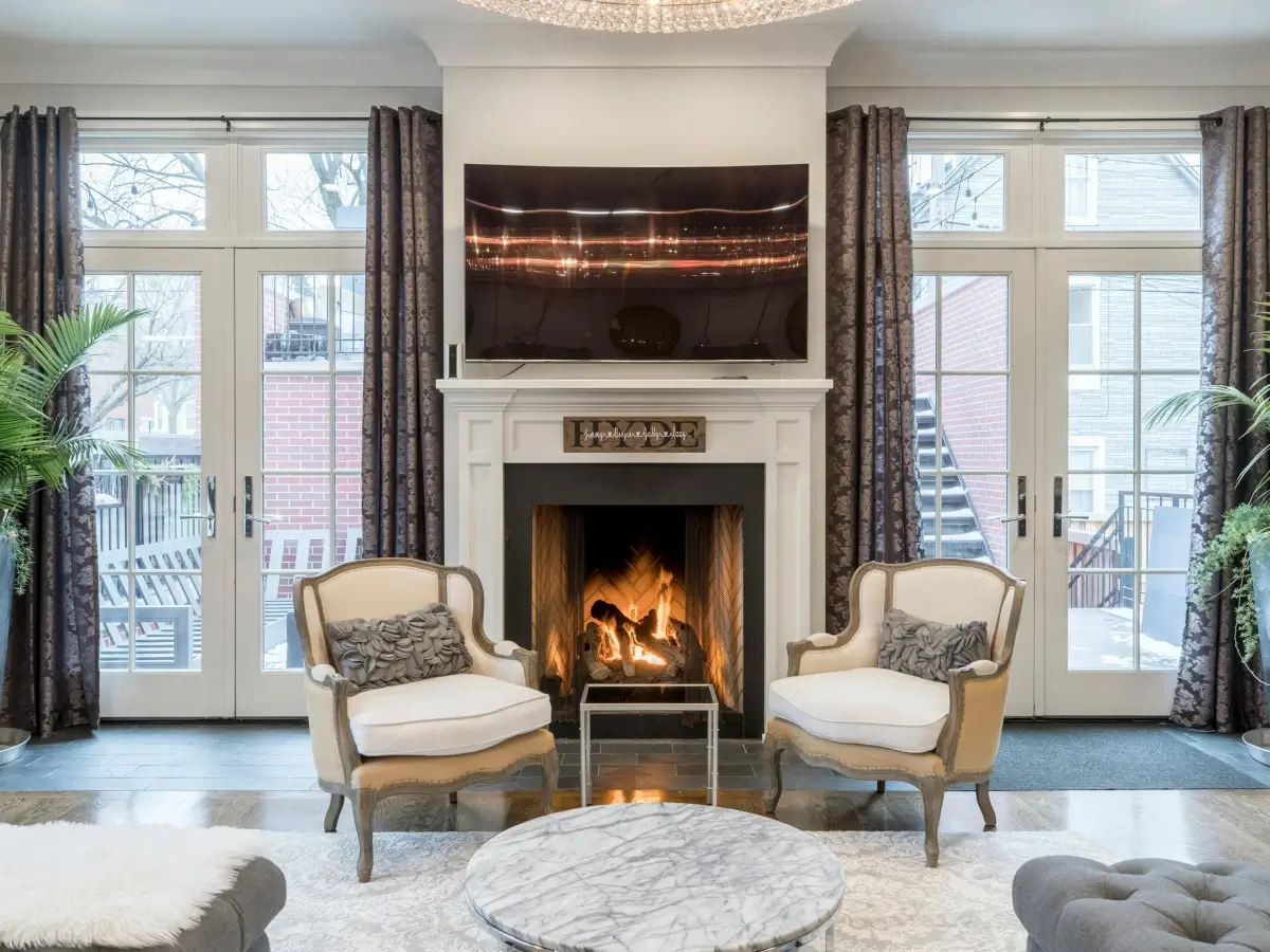 Marble tiles on a tiled fireplace in a Swansea home by Daffodil Tiling